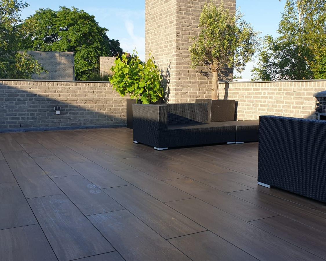 Renovatie dakterras met houtlooktegels Eindhoven