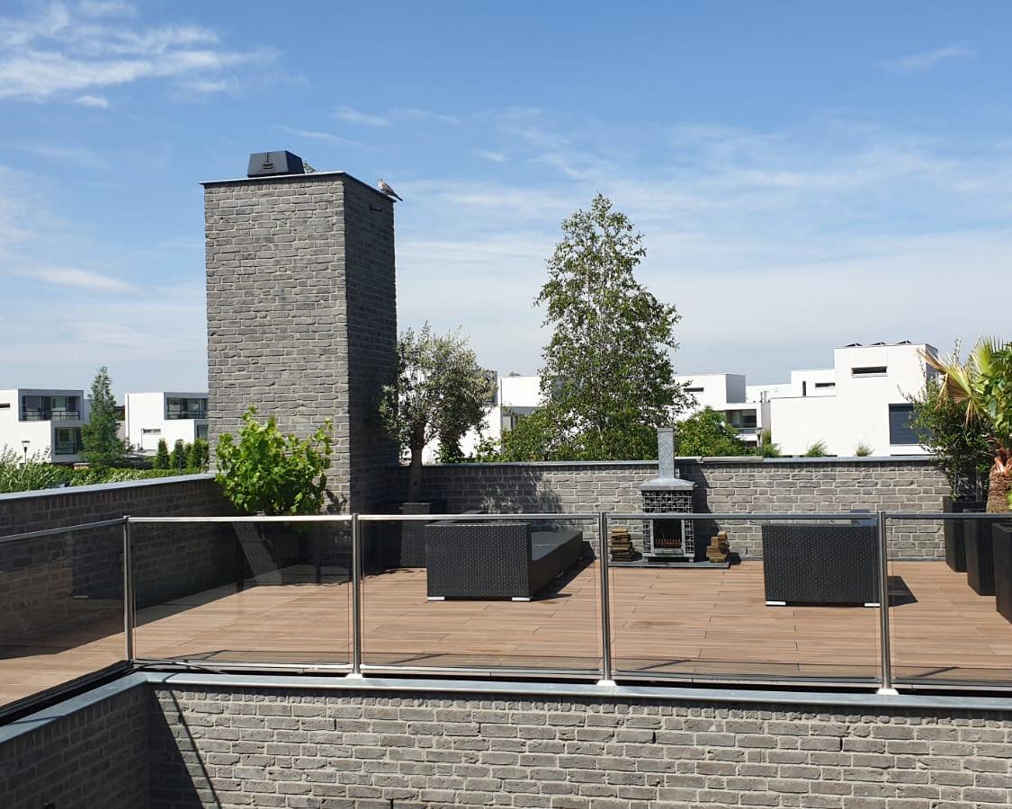 Renovatie dakterras met houtlooktegels Eindhoven